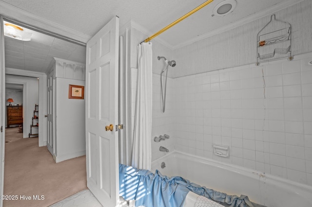 bathroom with crown molding, shower / bath combo with shower curtain, and a textured ceiling