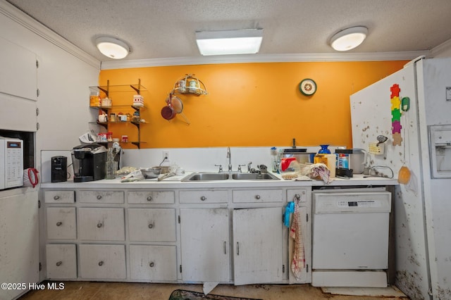 kitchen with ornamental molding, sink, a textured ceiling, and white appliances