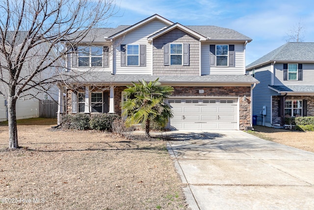 view of front of home featuring a garage and covered porch