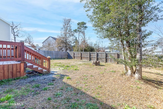 view of yard with a deck