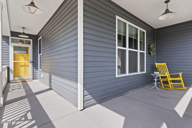 view of patio featuring a porch