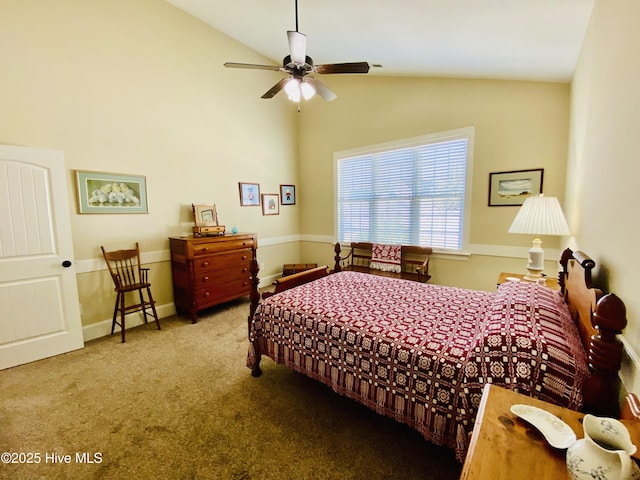 carpeted bedroom with vaulted ceiling and ceiling fan