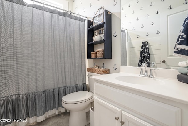 full bathroom with tile patterned flooring, vanity, shower / tub combo with curtain, and toilet