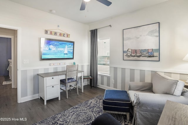 interior space featuring dark wood-type flooring and ceiling fan