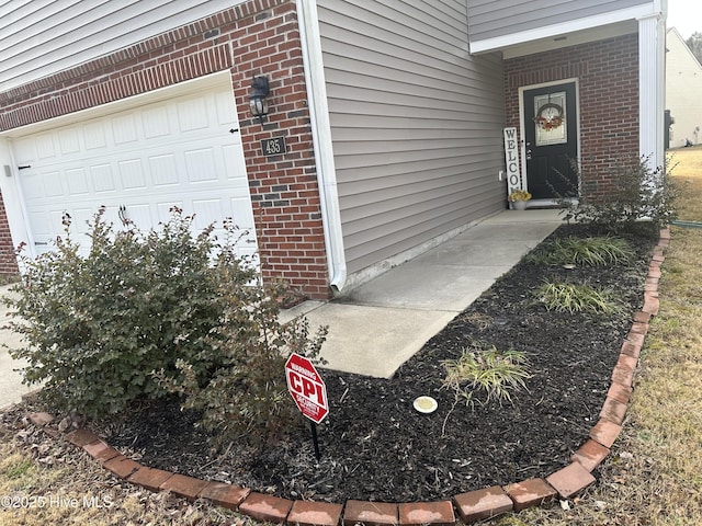 entrance to property with a garage