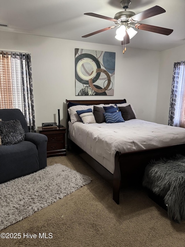 bedroom with carpet flooring and ceiling fan