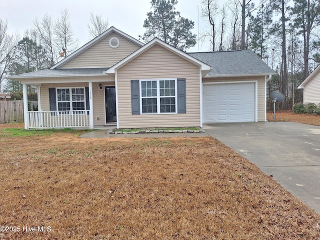 single story home featuring a garage, a front yard, and a porch