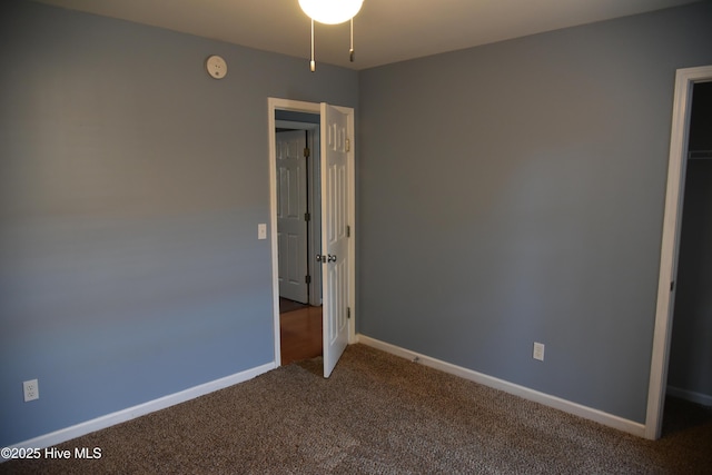 unfurnished bedroom with carpet