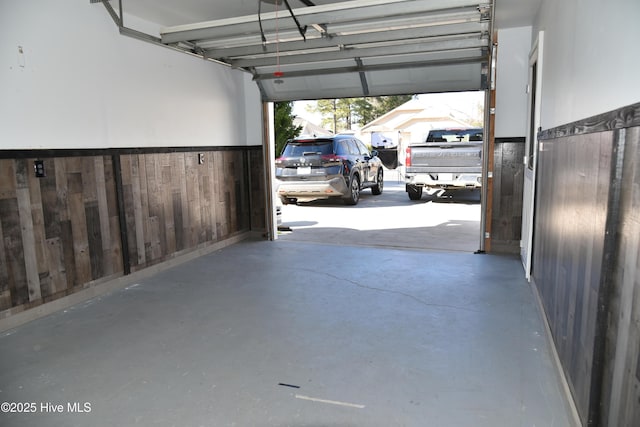 garage with wood walls