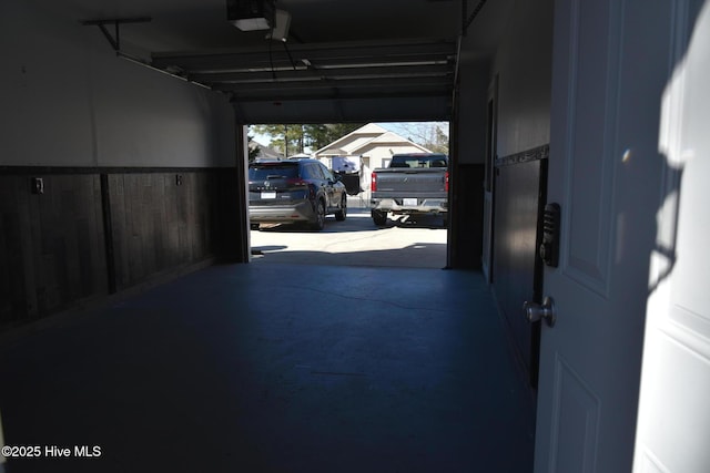 garage featuring a garage door opener