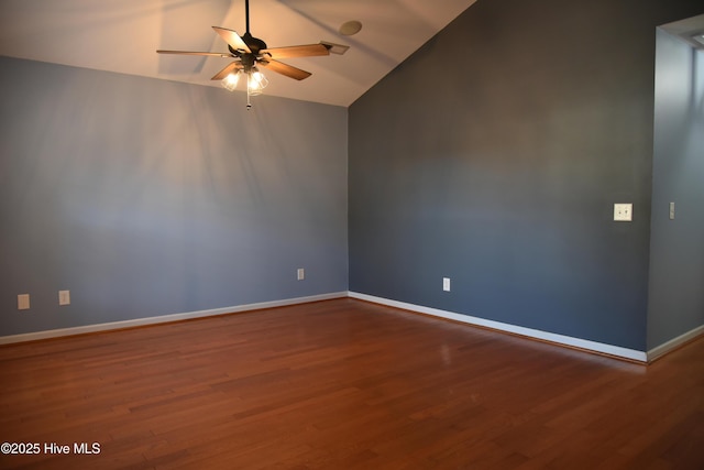 spare room featuring ceiling fan, wood-type flooring, and lofted ceiling