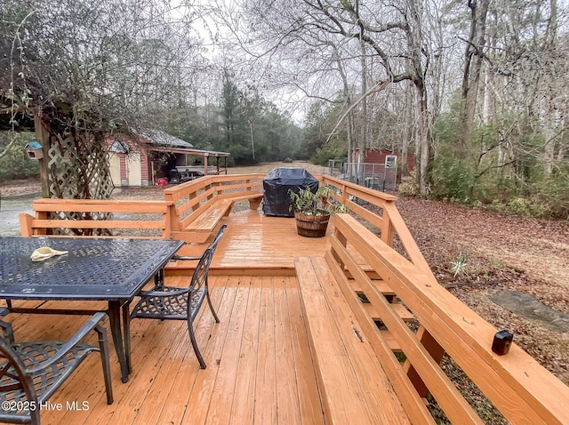 deck featuring an outbuilding and grilling area