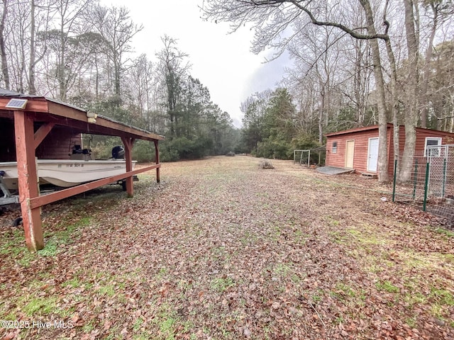 view of yard with an outdoor structure