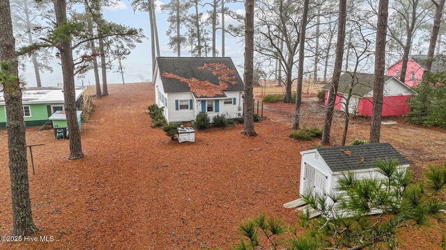 exterior space with an outbuilding