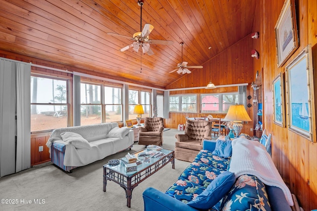 carpeted living room featuring lofted ceiling, wood ceiling, and wooden walls