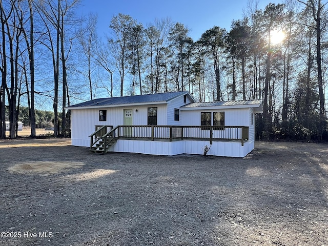 view of front of house featuring a wooden deck