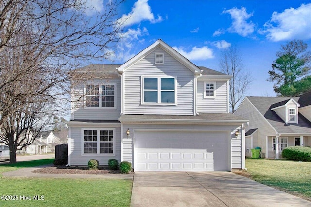 view of front facade with a garage and a front yard