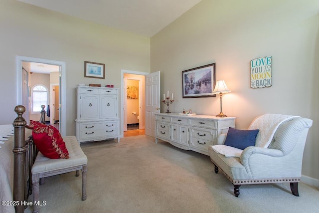 living area with light colored carpet