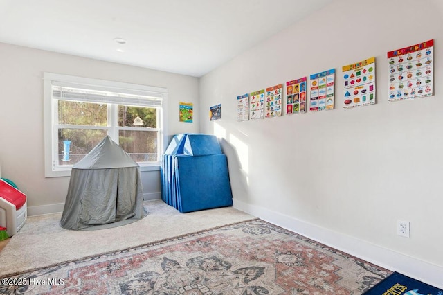 recreation room featuring carpet