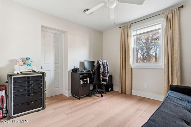 office featuring light hardwood / wood-style flooring and ceiling fan