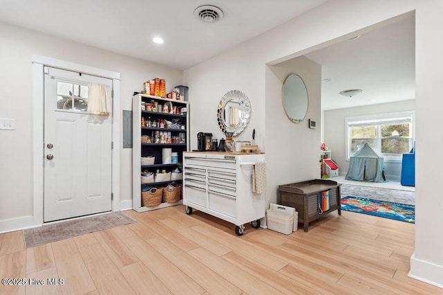 entrance foyer featuring light wood-type flooring