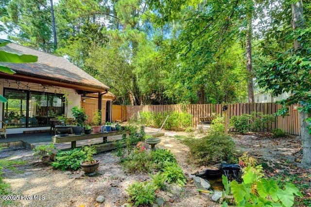 view of yard featuring a deck