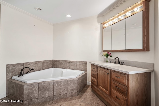 bathroom featuring tile patterned flooring, a garden tub, vanity, and crown molding