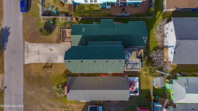 birds eye view of property with a residential view