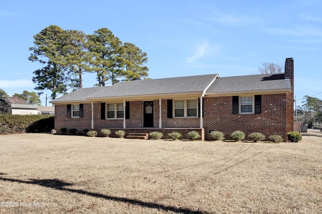 single story home with a porch