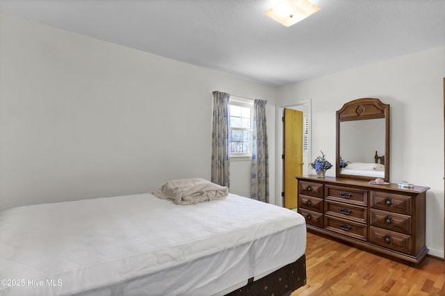 bedroom featuring light hardwood / wood-style floors