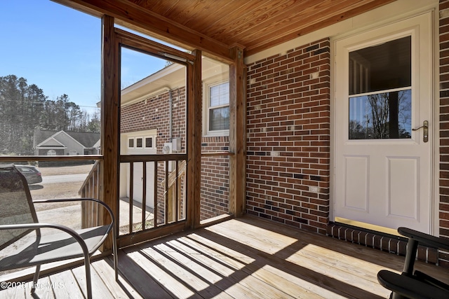 sunroom / solarium with wood ceiling