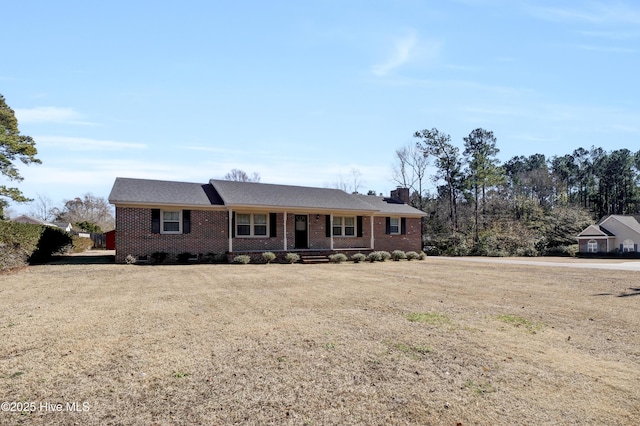 ranch-style house with a front yard