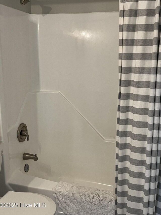 1801 Canal Dr Unit D14, Carolina Beach, NC 28428 - full bathroom with toilet and shower / bathtub combination with curtain
