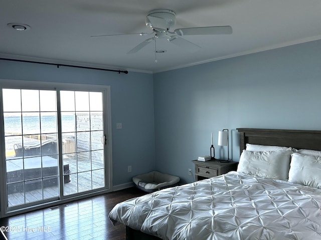 bedroom featuring a water view, crown molding, access to outside, ceiling fan, and hardwood / wood-style floors