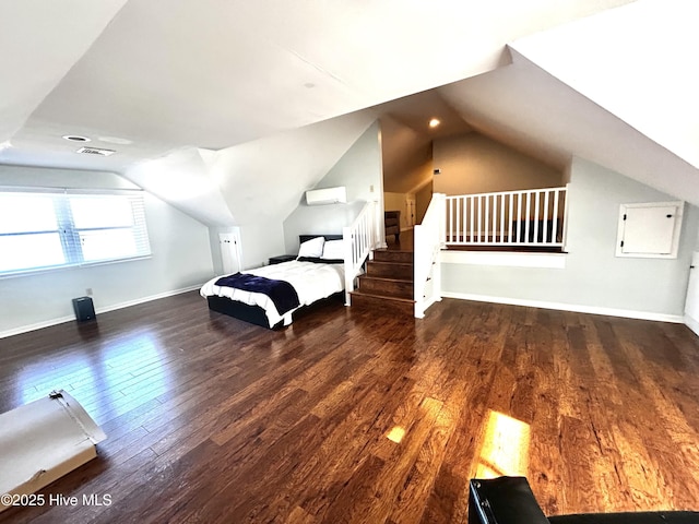 unfurnished bedroom featuring dark hardwood / wood-style floors and vaulted ceiling