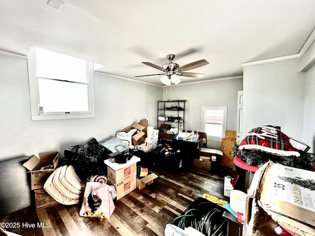 misc room featuring ornamental molding, dark hardwood / wood-style floors, and ceiling fan