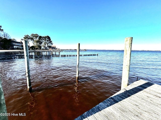 view of dock with a water view