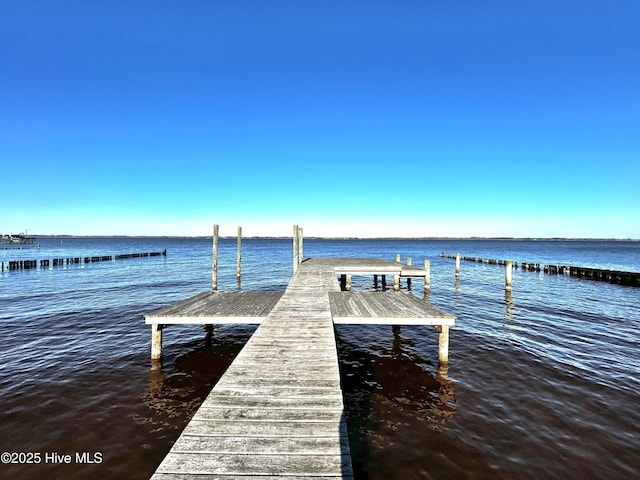 view of dock with a water view