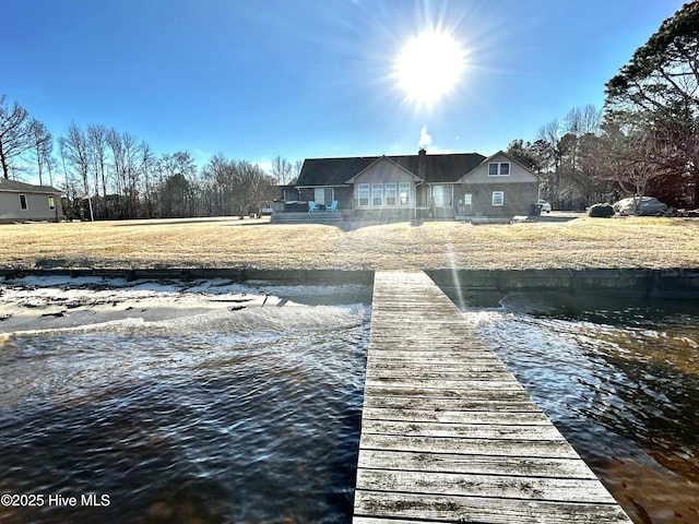 view of dock with a water view