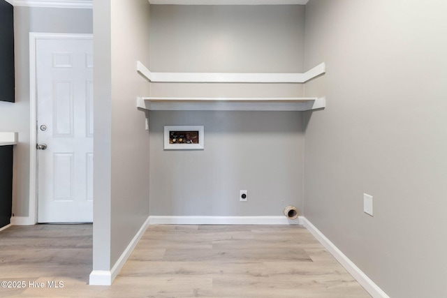 laundry area featuring washer hookup, hookup for an electric dryer, and light hardwood / wood-style flooring