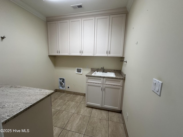 laundry area featuring visible vents, washer hookup, cabinet space, electric dryer hookup, and a sink