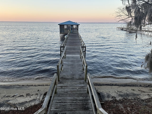 dock area featuring a water view