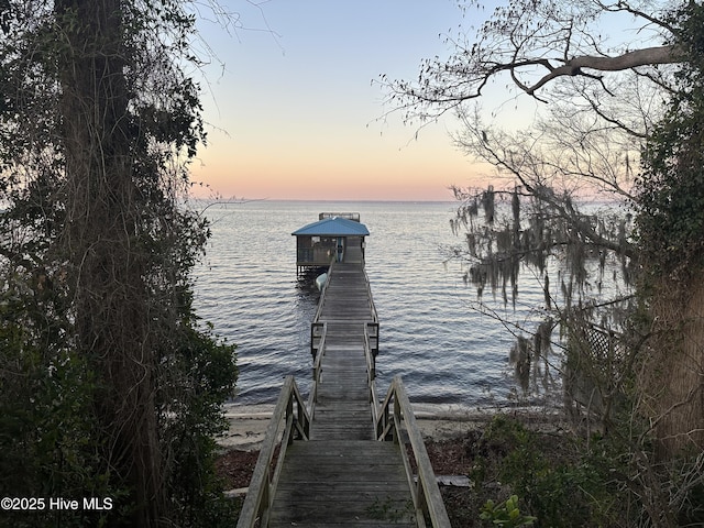 dock area featuring a water view