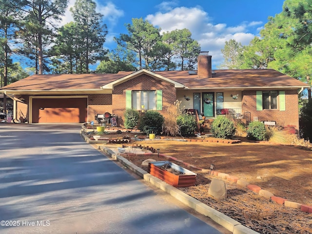 ranch-style home with a garage