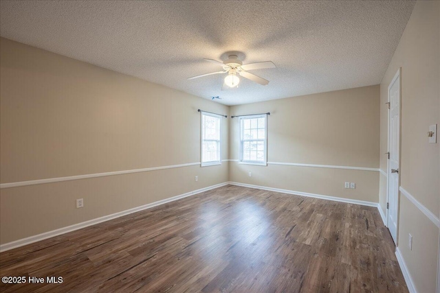 unfurnished room with ceiling fan, wood-type flooring, and a textured ceiling