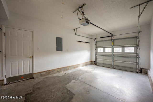 garage featuring a garage door opener and electric panel