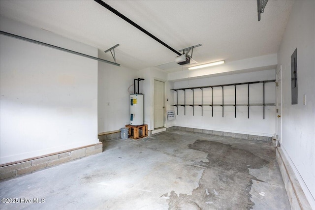 garage featuring water heater, a garage door opener, and electric panel