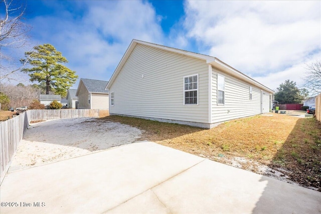 view of property exterior featuring a patio