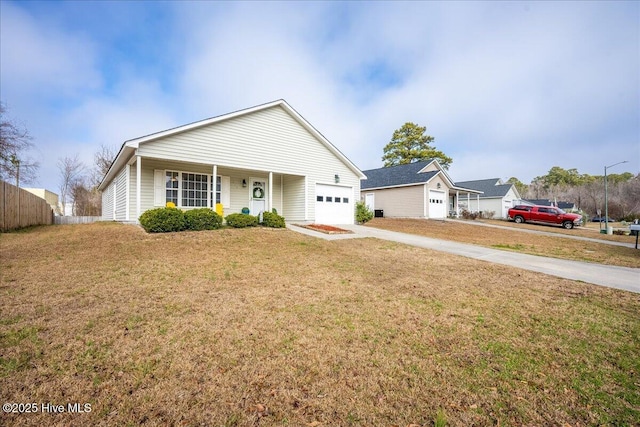 view of front of property featuring a porch, a garage, and a front lawn