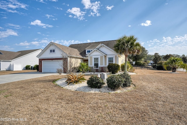 ranch-style home featuring a garage and a front yard